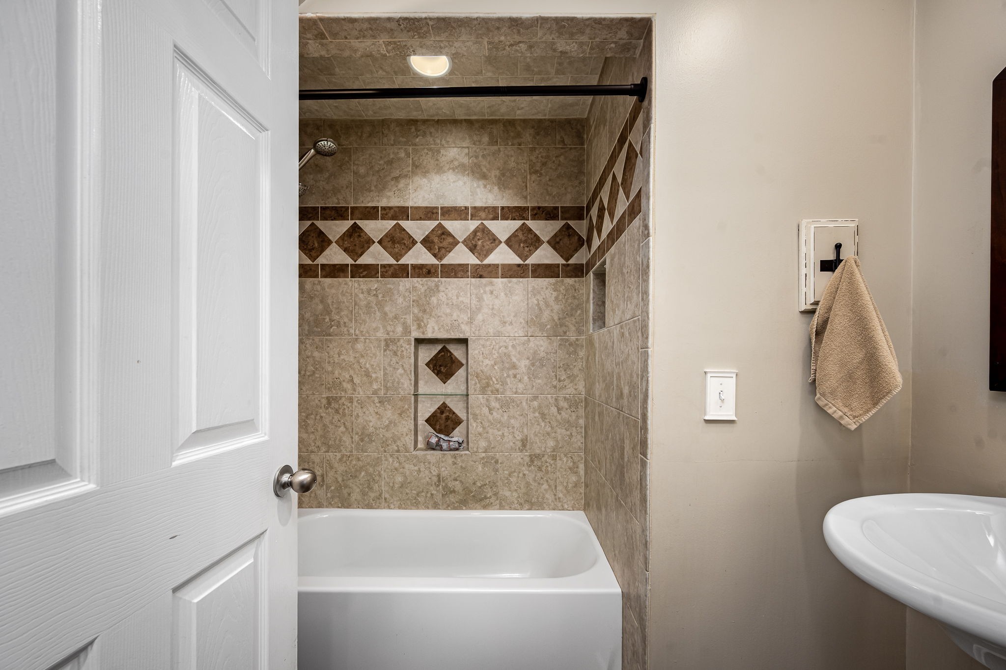 6580 Burkitt Road Antioch, TN 37013 - Photo 25 of 62 a bathroom with a bathtub and shower