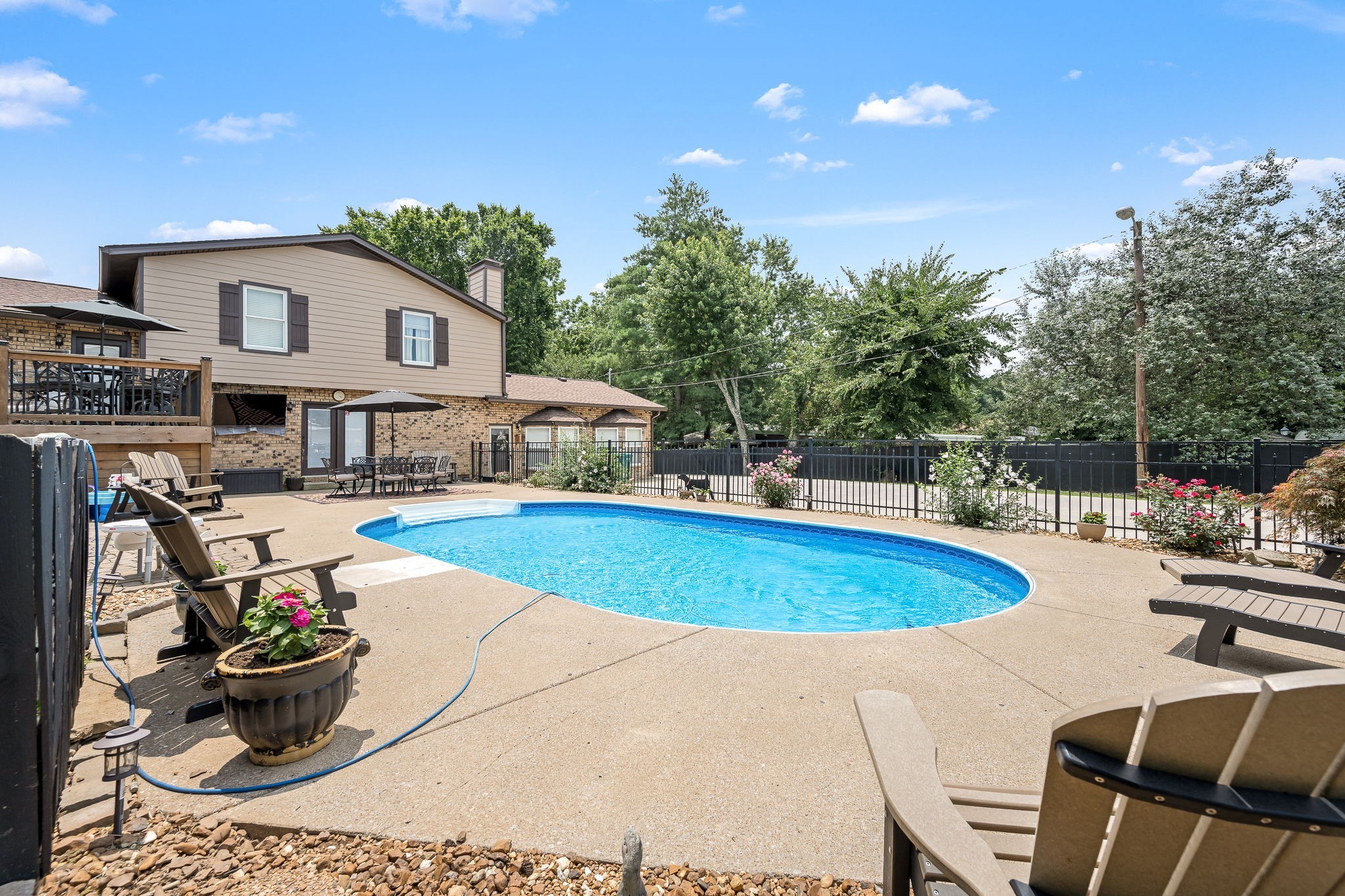 6580 Burkitt Road Antioch, TN 37013 - Photo 36 of 62 a view of a swimming pool with a patio