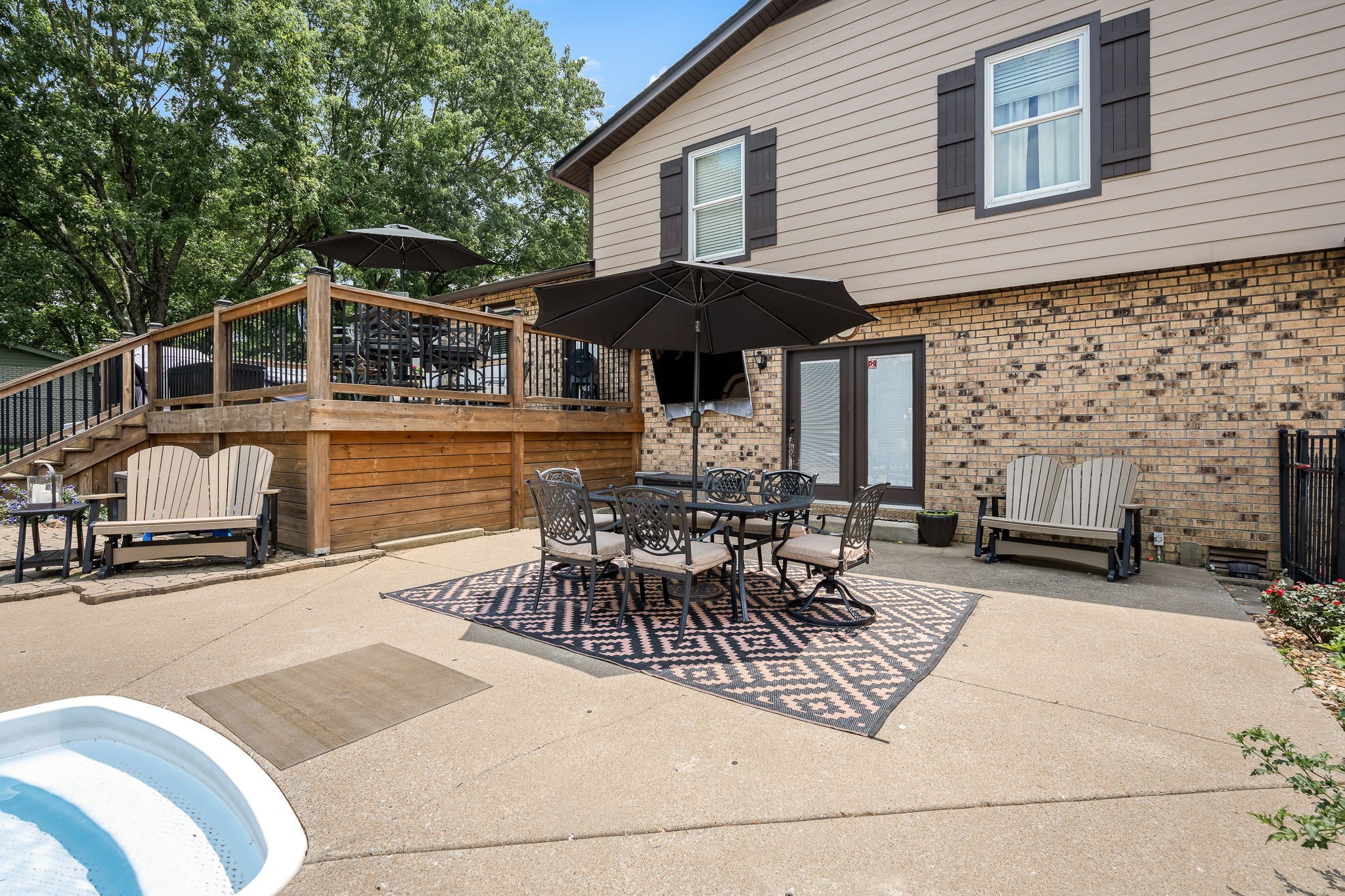 6580 Burkitt Road Antioch, TN 37013 - Photo 40 of 62 a patio with table and chairs