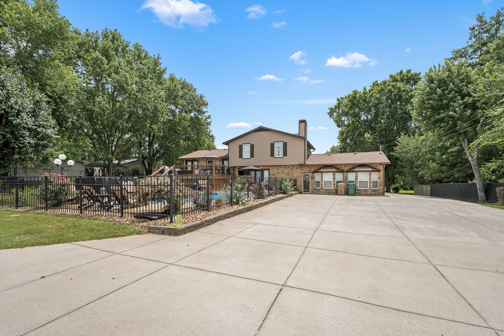 6580 Burkitt Road Antioch, TN 37013 - Photo 41 of 62 a view of a house with yard and sitting area