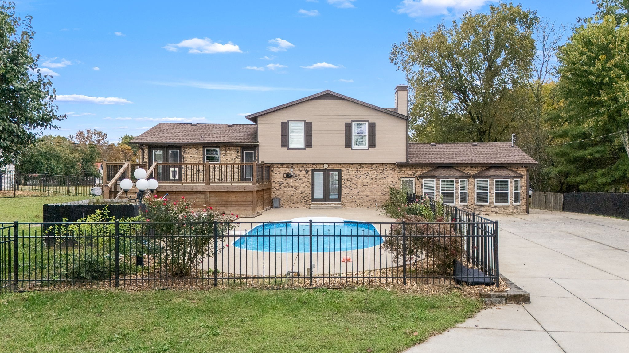 6580 Burkitt Road Antioch, TN 37013 - Photo 56 of 62 a front view of a house with a garden