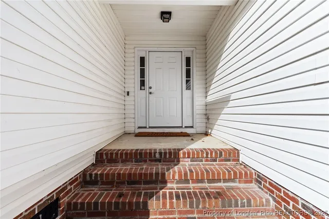 a view of a balcony with door
