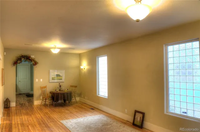 a view of a living room and dining room