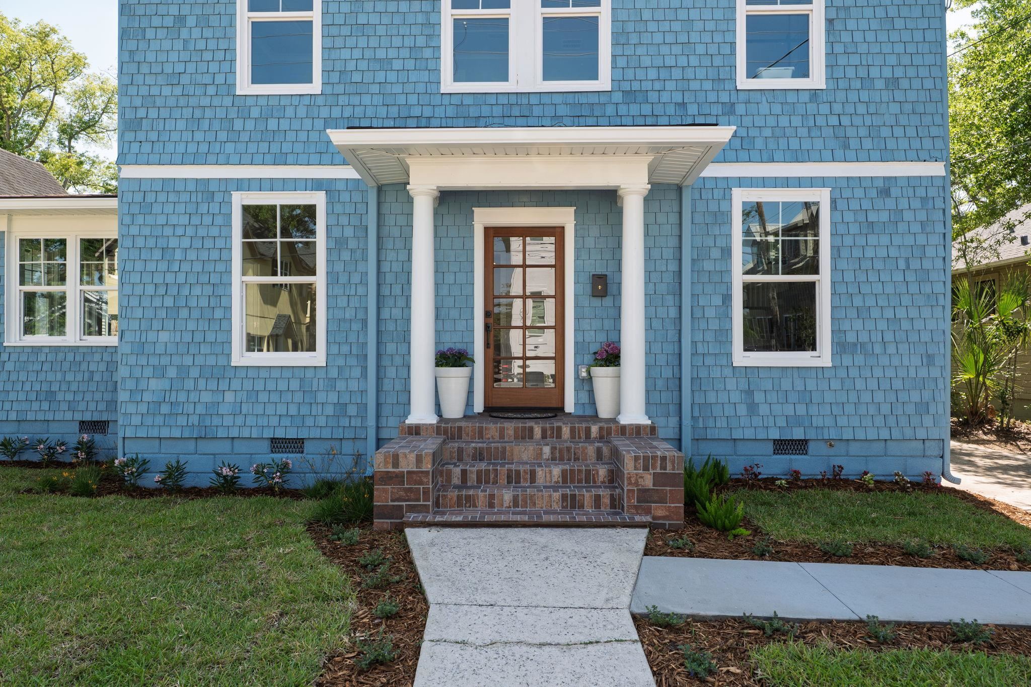 142 Washington Street St. Augustine, FL 32084 - Photo 17 of 53 a view of a brick house with a yard