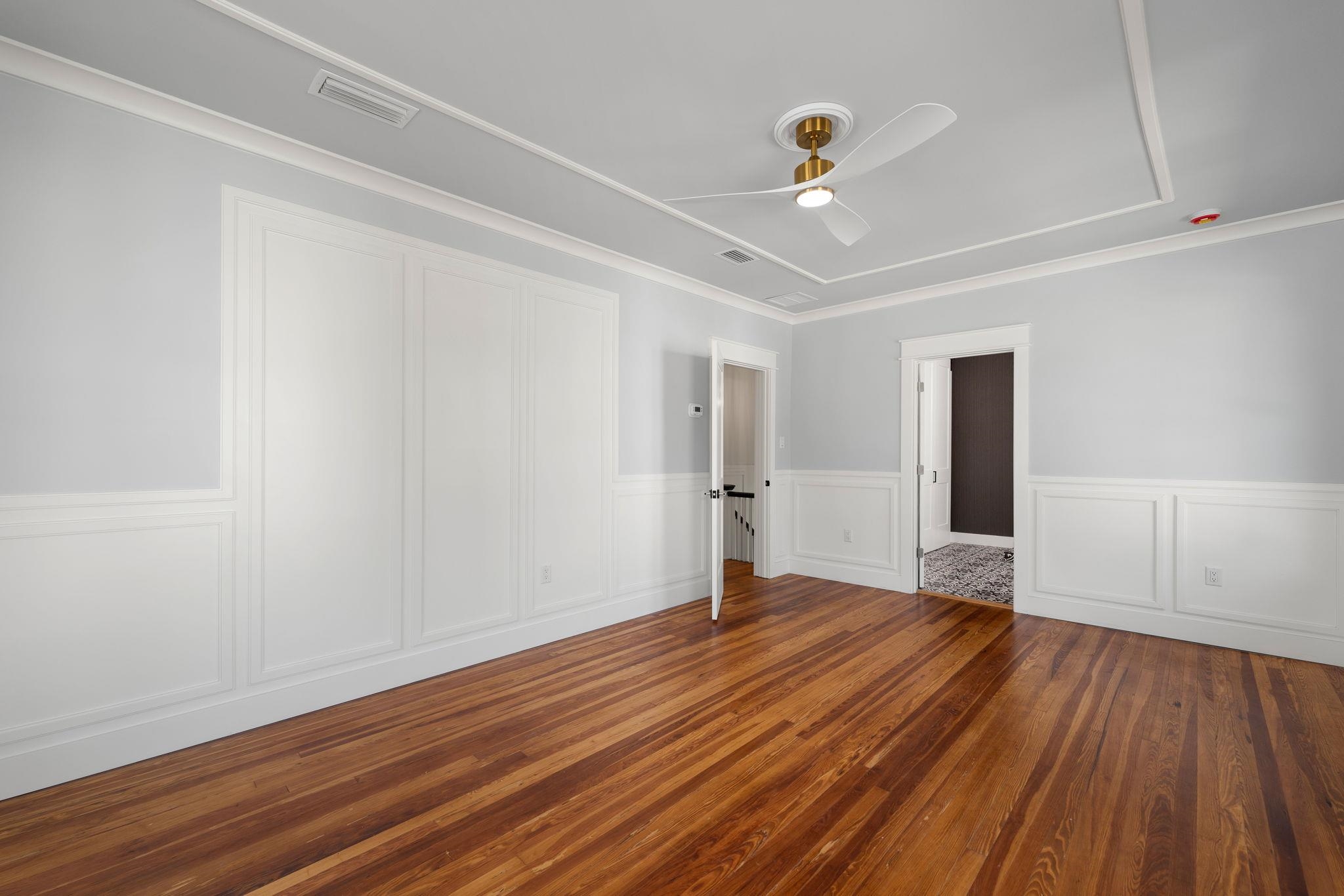 142 Washington Street St. Augustine, FL 32084 - Photo 36 of 53 a view of an empty room with wooden floor