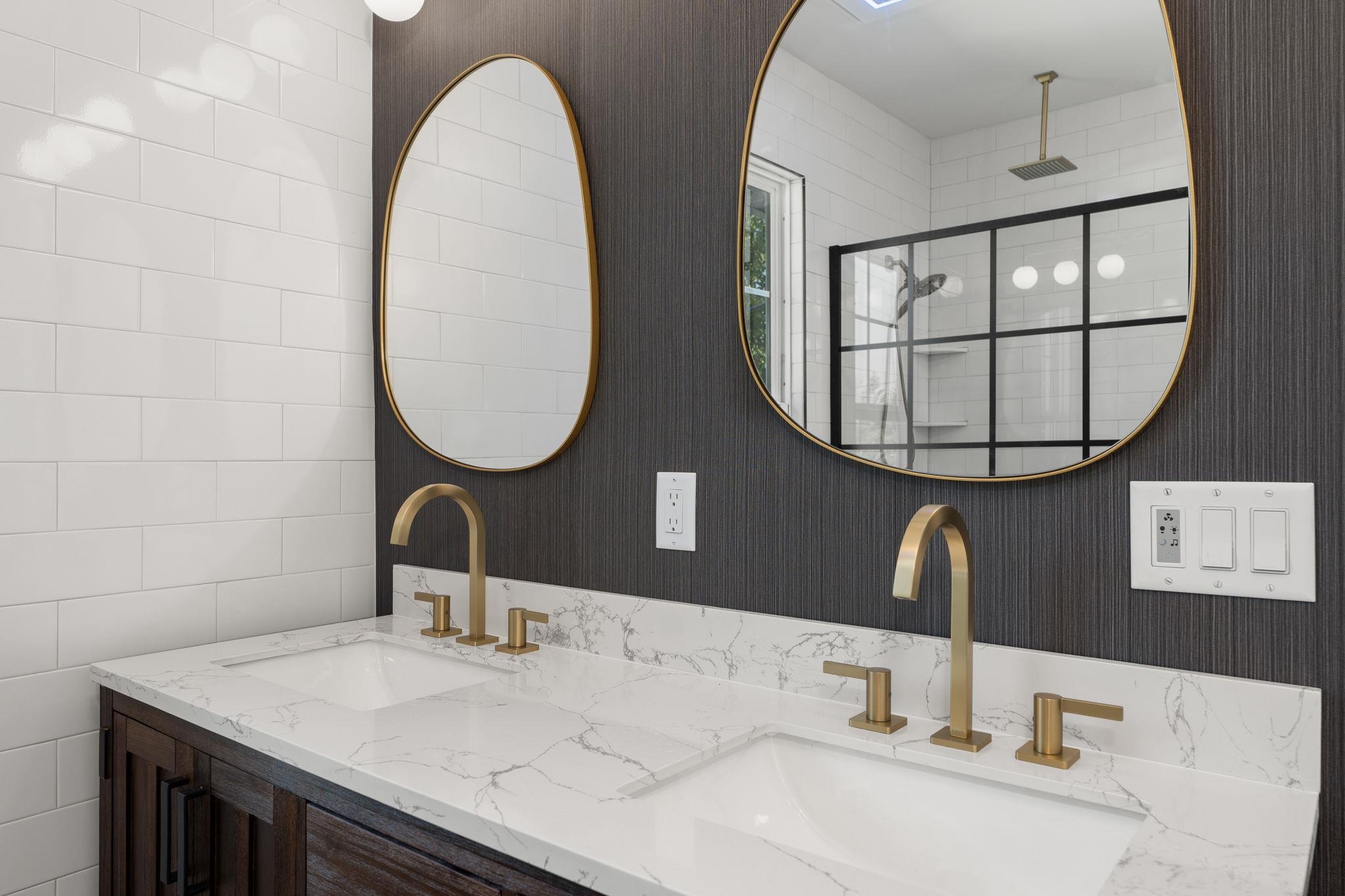142 Washington Street St. Augustine, FL 32084 - Photo 40 of 53 a bathroom with a sink and a mirror