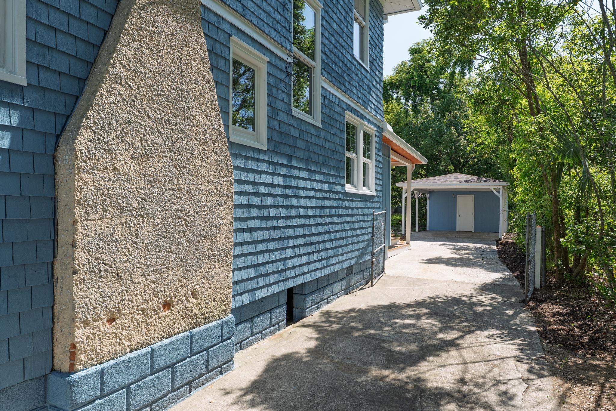 142 Washington Street St. Augustine, FL 32084 - Photo 52 of 53 a view of a house with a tree