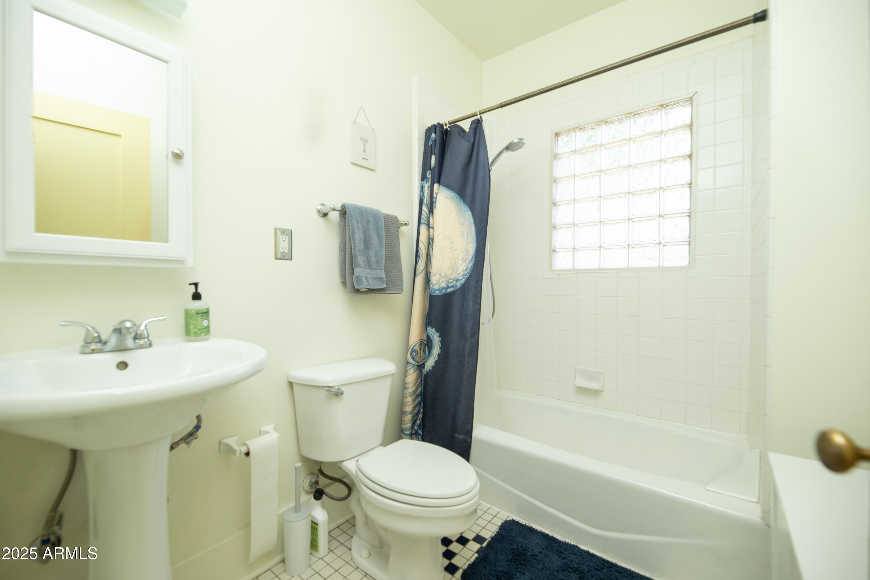 1650 North 10th Street Phoenix, AZ 85006 - Photo 19 of 29 a bathroom with a sink toilet and shower