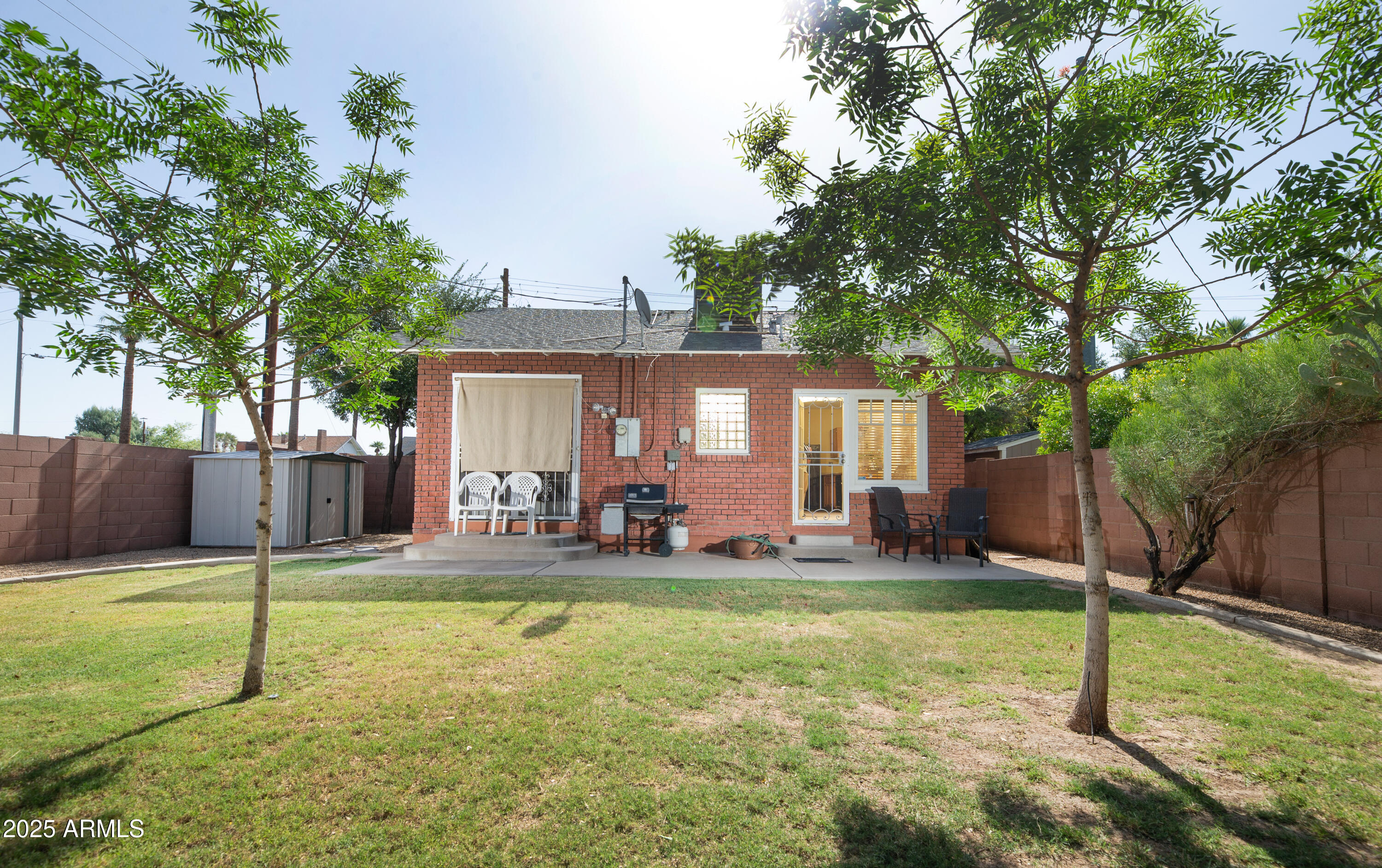 1650 North 10th Street Phoenix, AZ 85006 - Photo 25 of 29 a view of a house with a yard and sitting area
