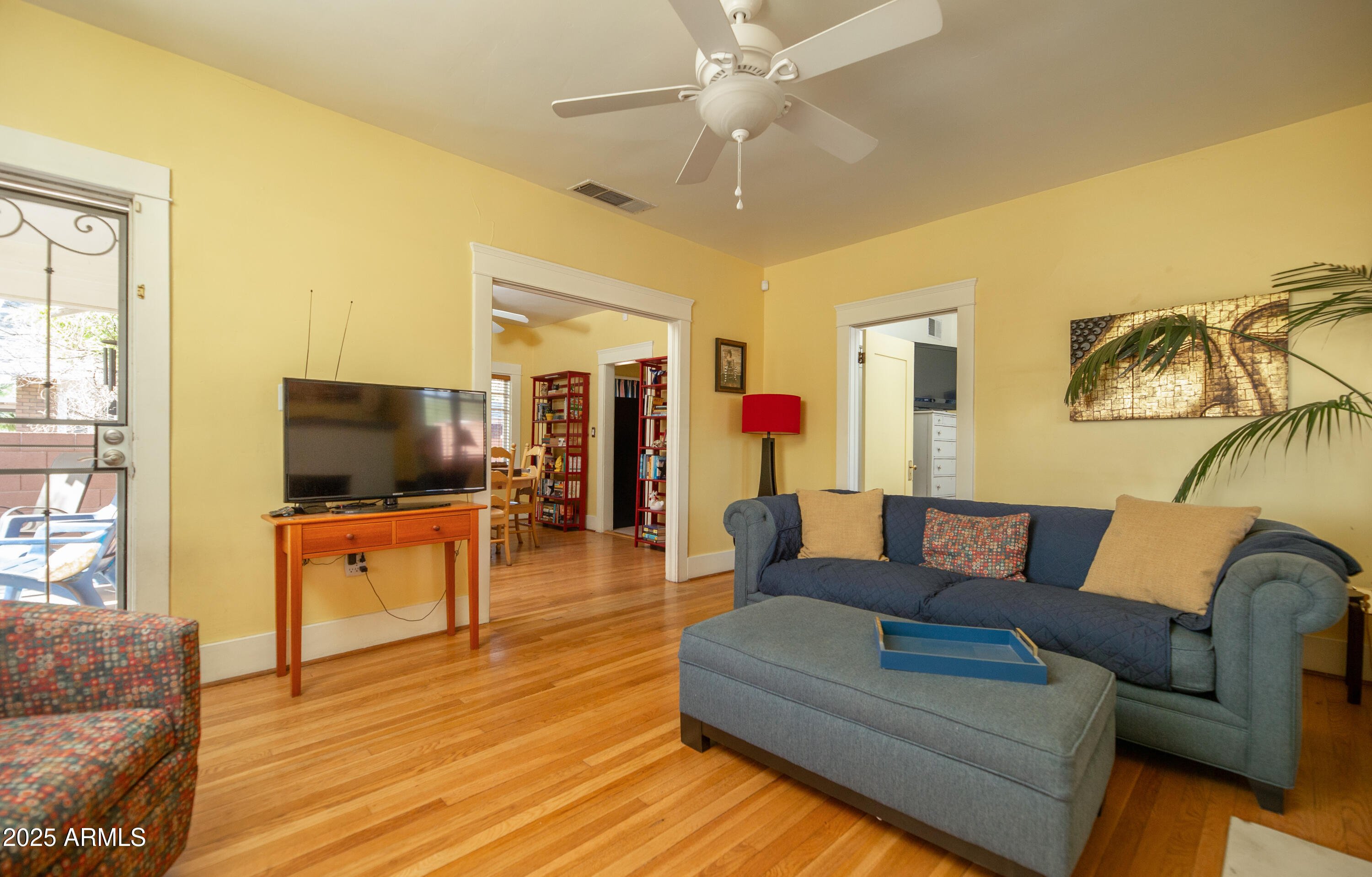 1650 North 10th Street Phoenix, AZ 85006 - Photo 6 of 29 a living room with furniture and a flat screen tv
