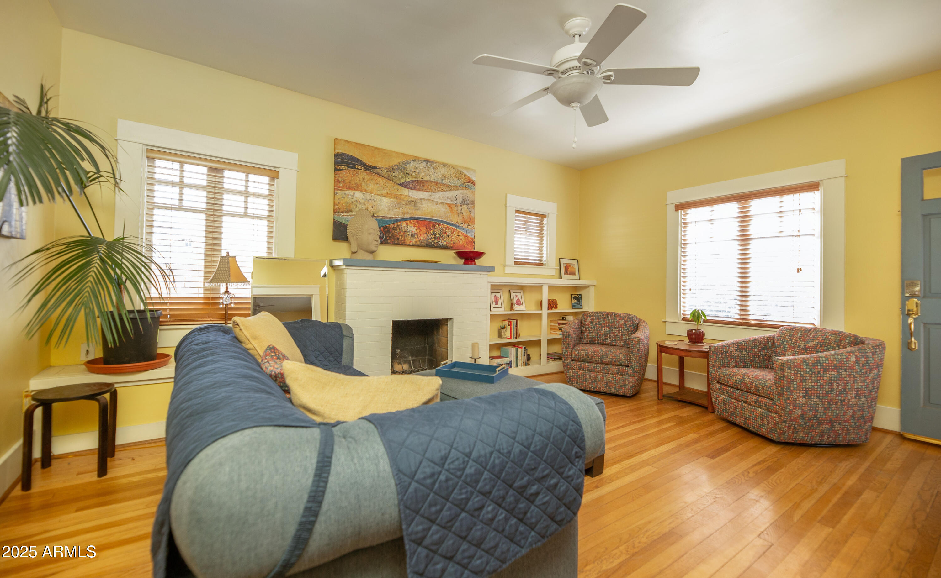 1650 North 10th Street Phoenix, AZ 85006 - Photo 7 of 29 a living room with furniture fireplace and a window