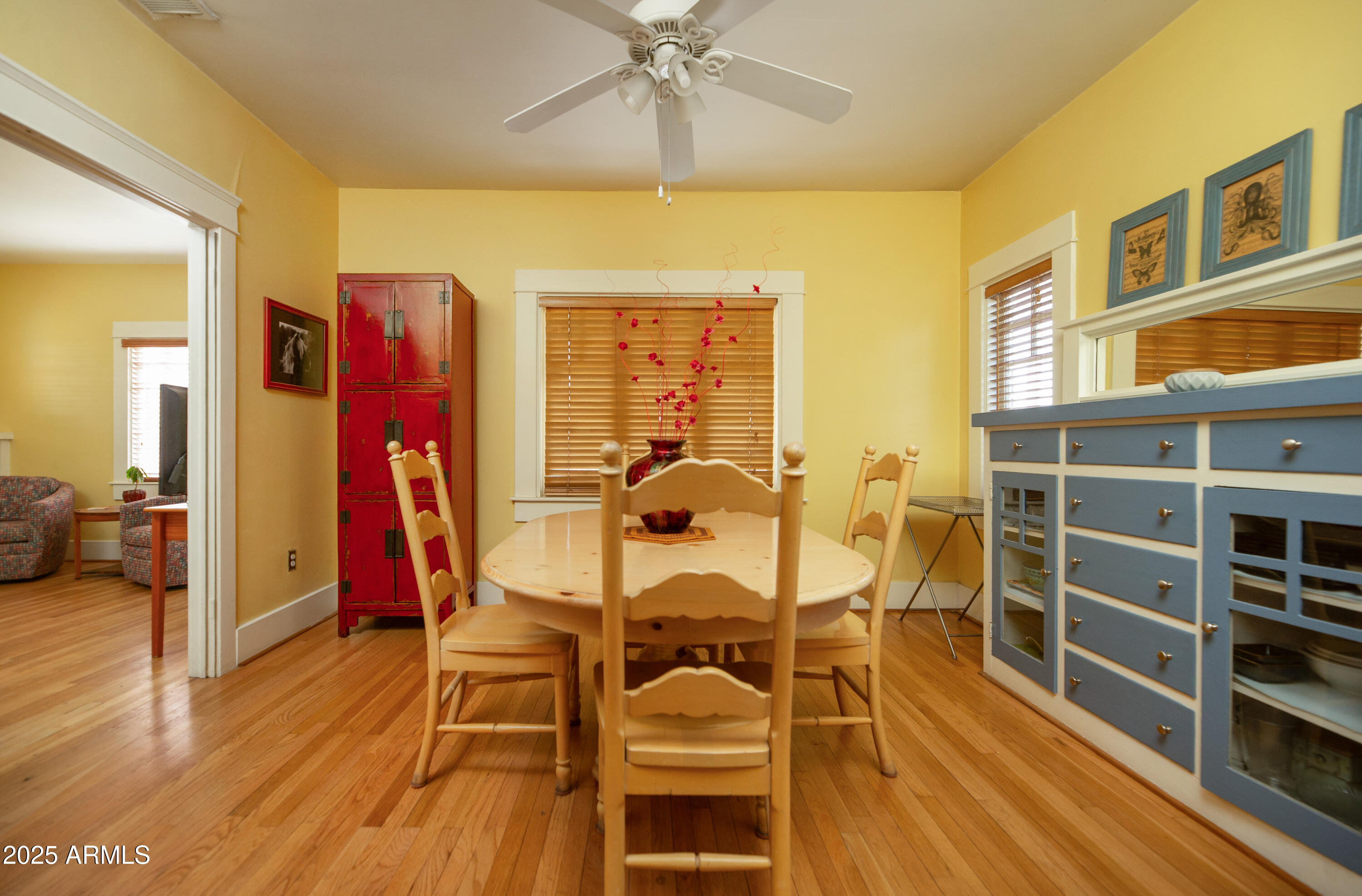 1650 North 10th Street Phoenix, AZ 85006 - Photo 10 of 29 a view of a dining room with furniture window and wooden floor