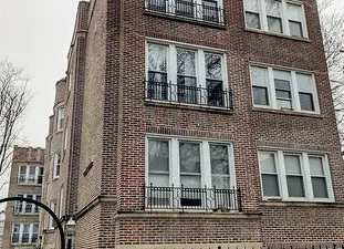 a building with a window and balcony