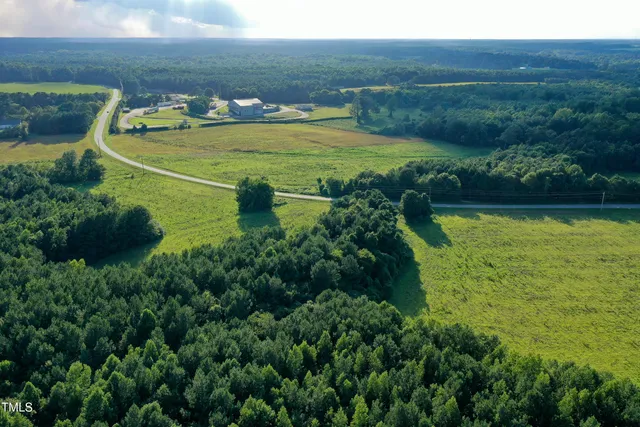a view of lake with green space