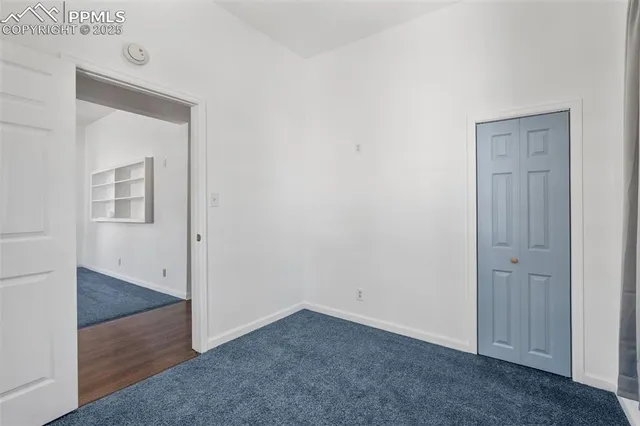 a kitchen with stainless steel appliances granite countertop a refrigerator and a stove