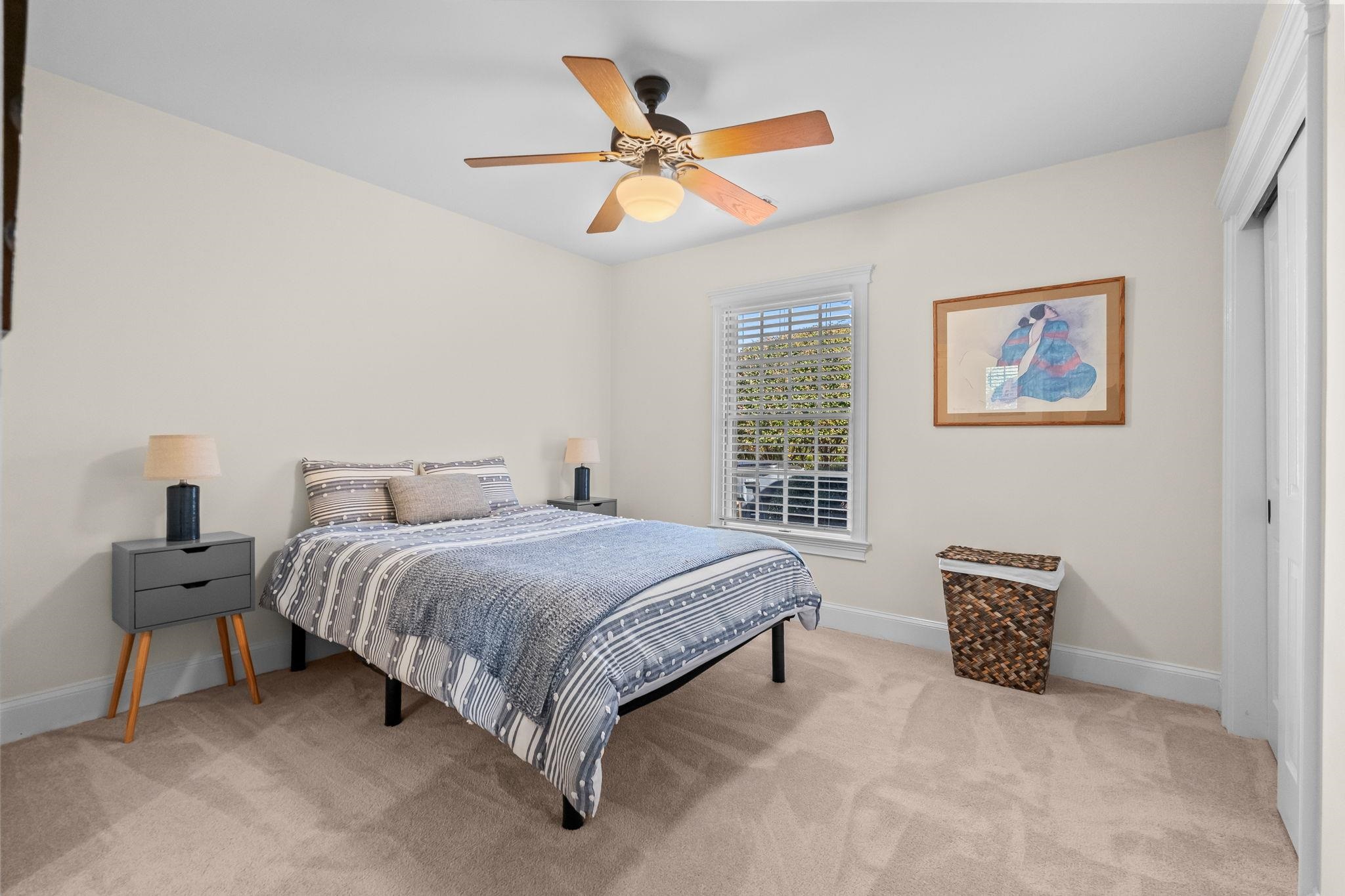 400 Foxtail Drive Longs, SC 29568 - Photo 31 of 40 Bedroom with light colored carpet, a ceiling fan, and a closet