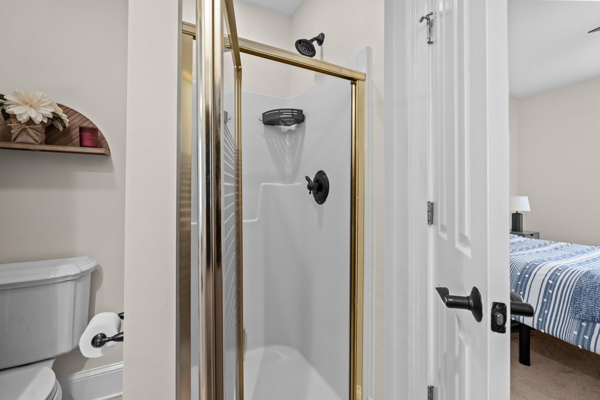 400 Foxtail Drive Longs, SC 29568 - Photo 33 of 40 Ensuite bathroom featuring a stall shower and toilet