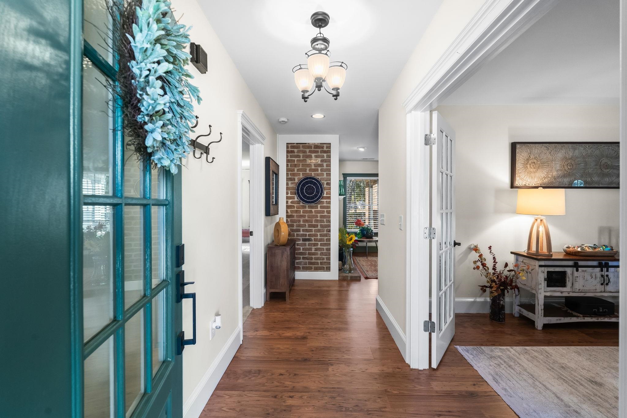 400 Foxtail Drive Longs, SC 29568 - Photo 5 of 40 Foyer entrance with dark wood finished floors, a chandelier, and recessed lighting