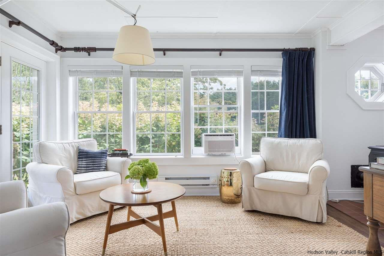 1162 Plains Road Wallkill, NY 12589 - Photo 15 of 35 a living room with furniture and a large window