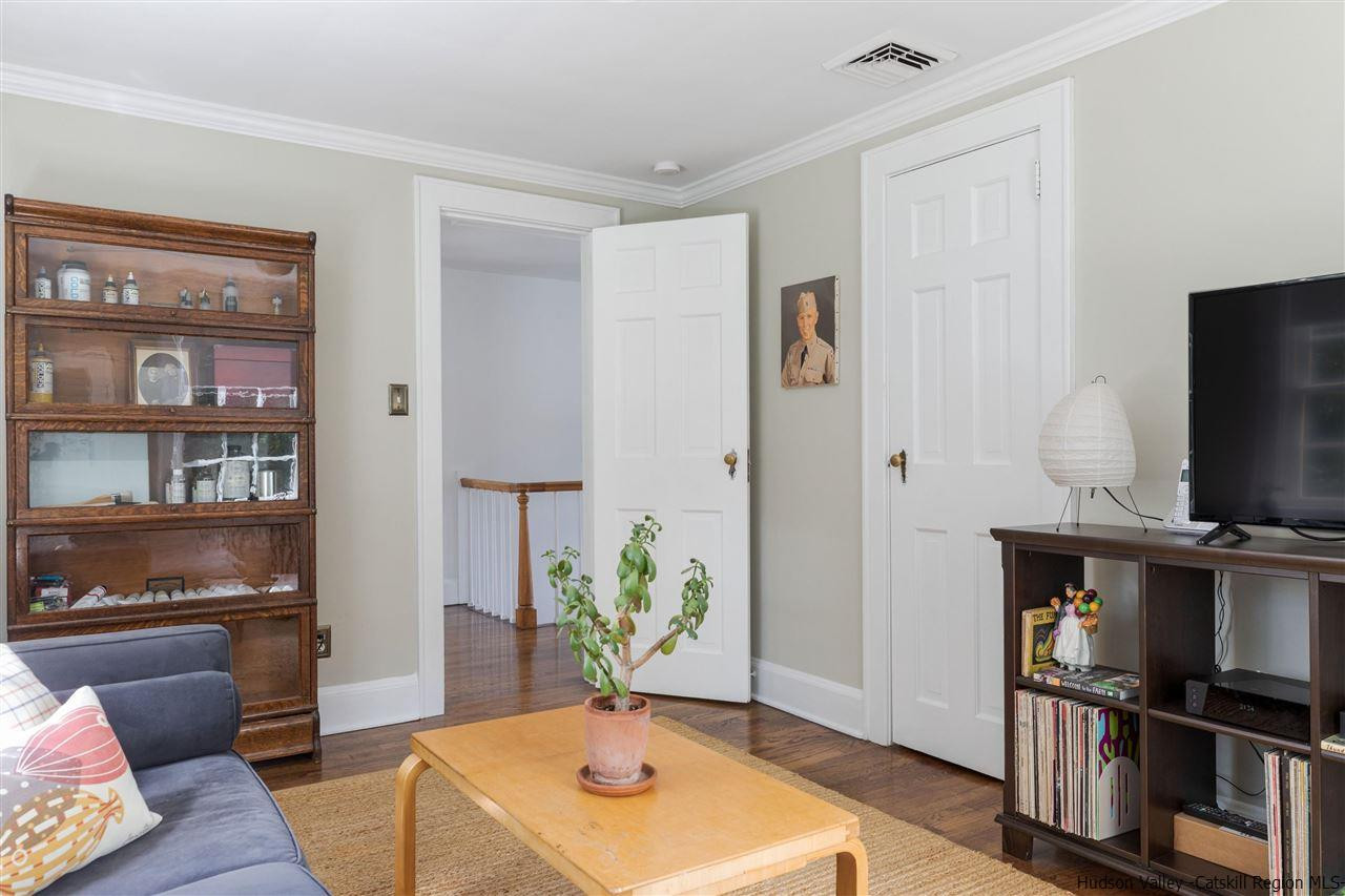 1162 Plains Road Wallkill, NY 12589 - Photo 27 of 35 a living room with furniture and a flat screen tv