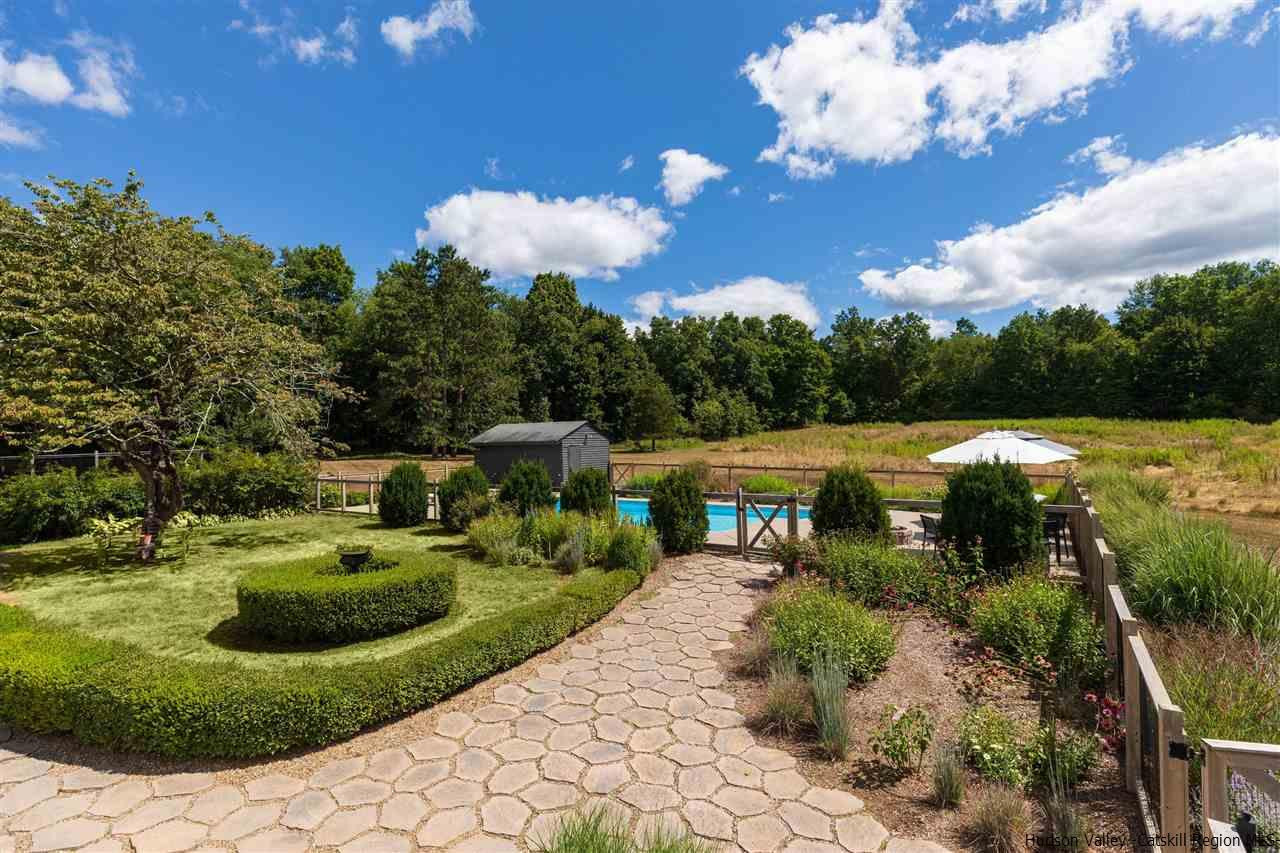 1162 Plains Road Wallkill, NY 12589 - Photo 32 of 35 a view of a street with a houses in the back