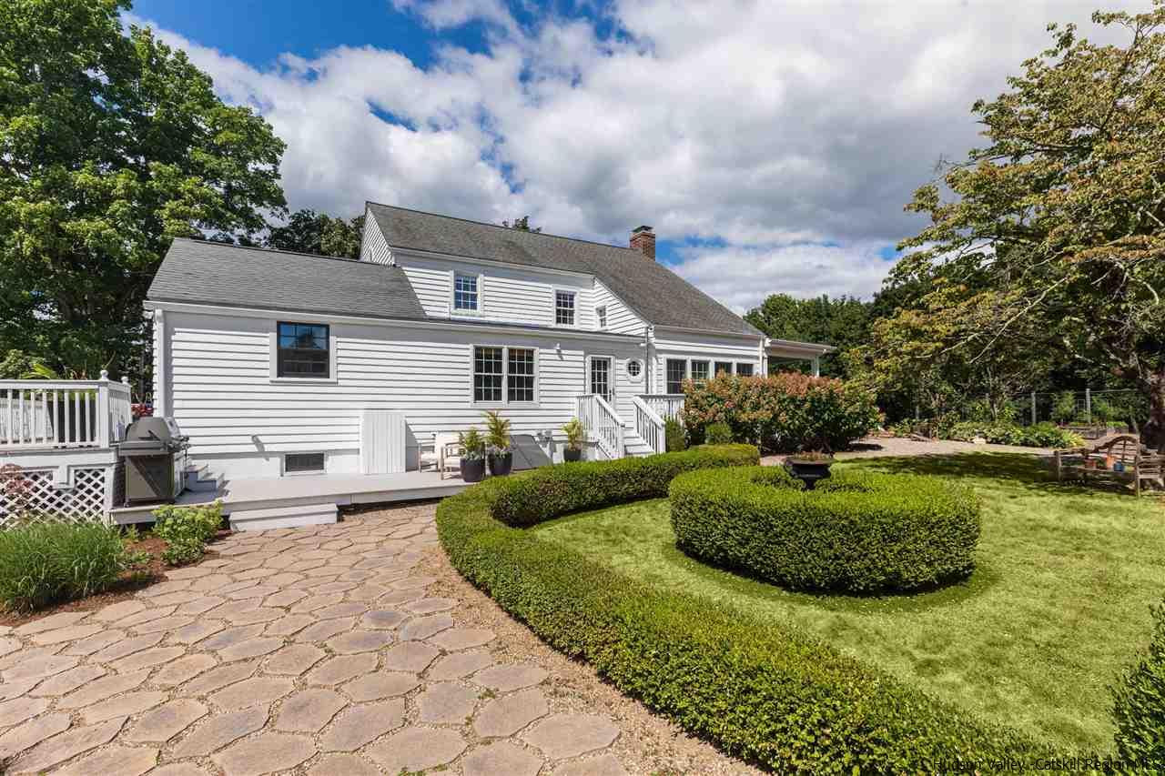 1162 Plains Road Wallkill, NY 12589 - Photo 34 of 35 a front view of a house with garden