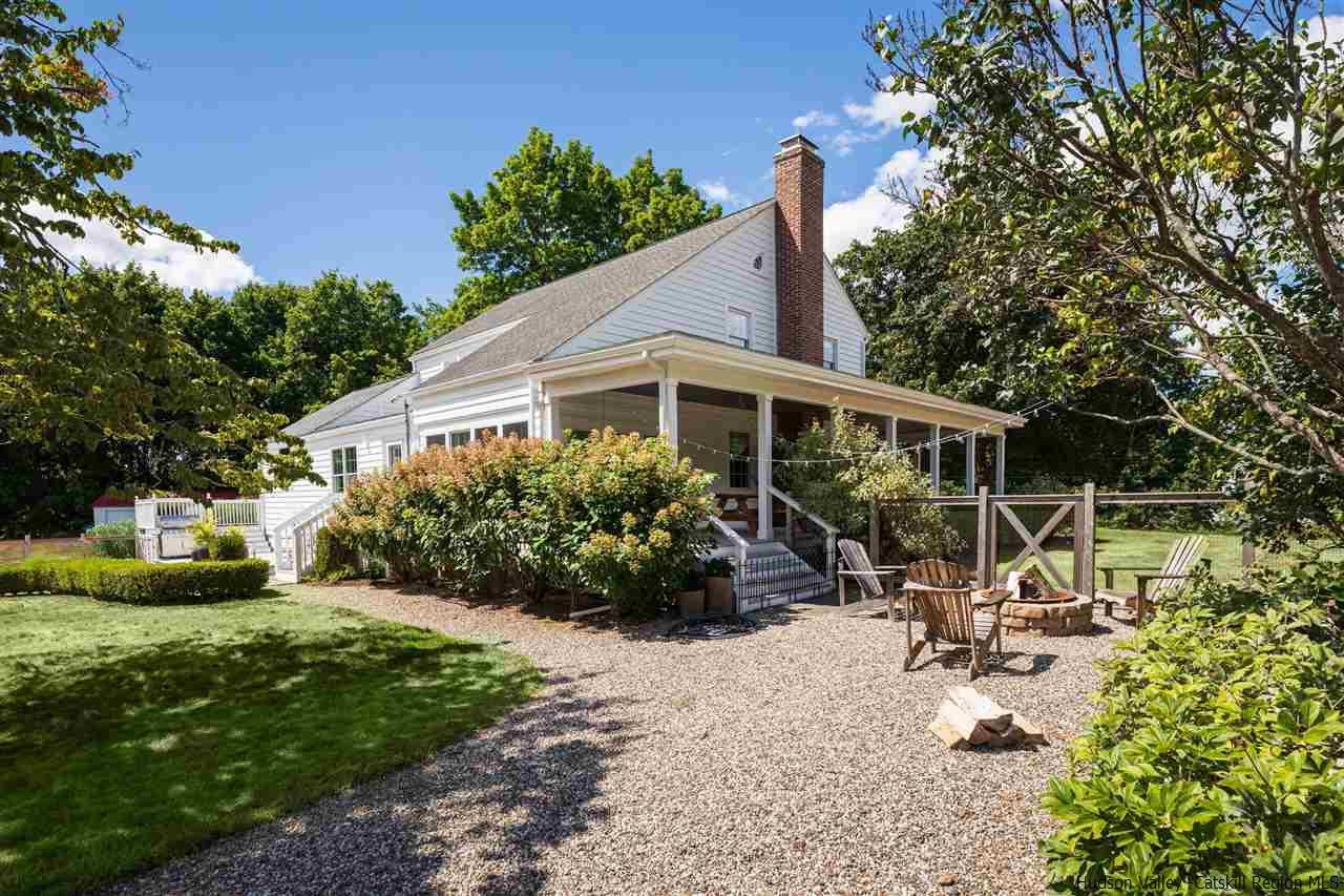 1162 Plains Road Wallkill, NY 12589 - Photo 35 of 35 a view of a house with backyard sitting area and garden