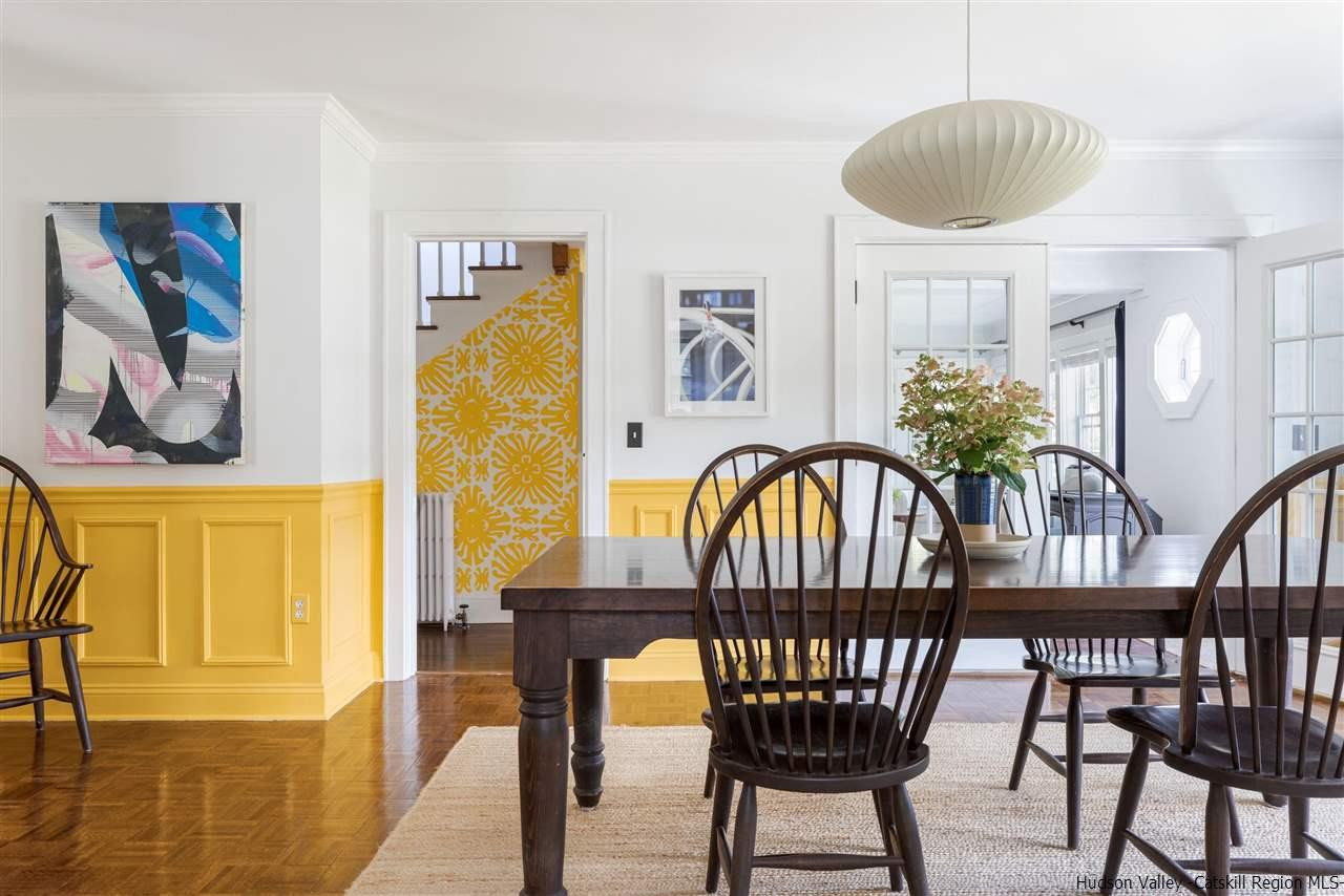 1162 Plains Road Wallkill, NY 12589 - Photo 4 of 35 a view of a dining room with furniture window and wooden floor