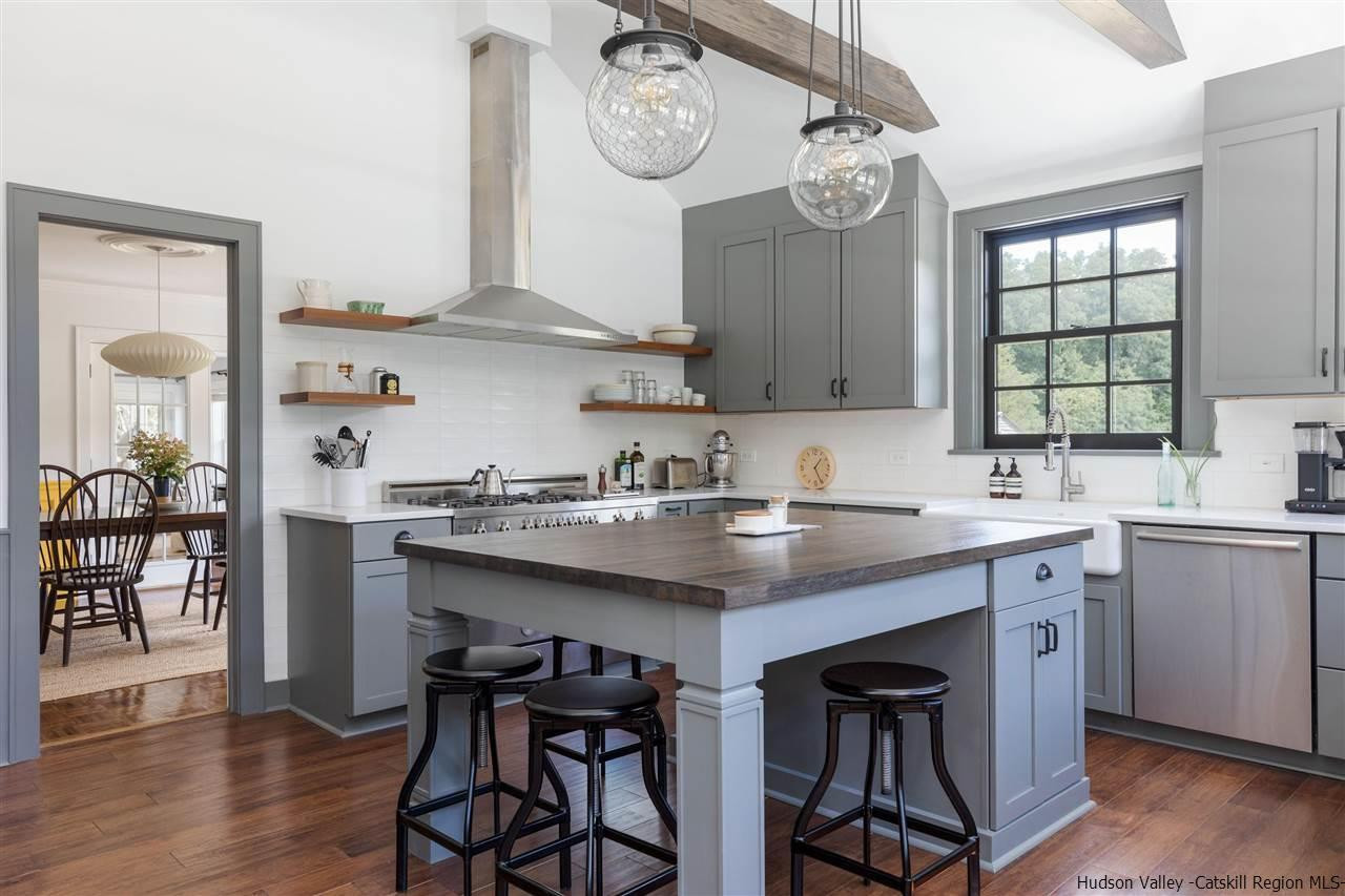 1162 Plains Road Wallkill, NY 12589 - Photo 5 of 35 a kitchen with a sink cabinets and window