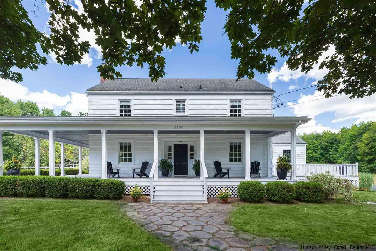 1162 Plains Road Wallkill, NY 12589 - Photo 10 of 35 a view of a house with a yard and plants