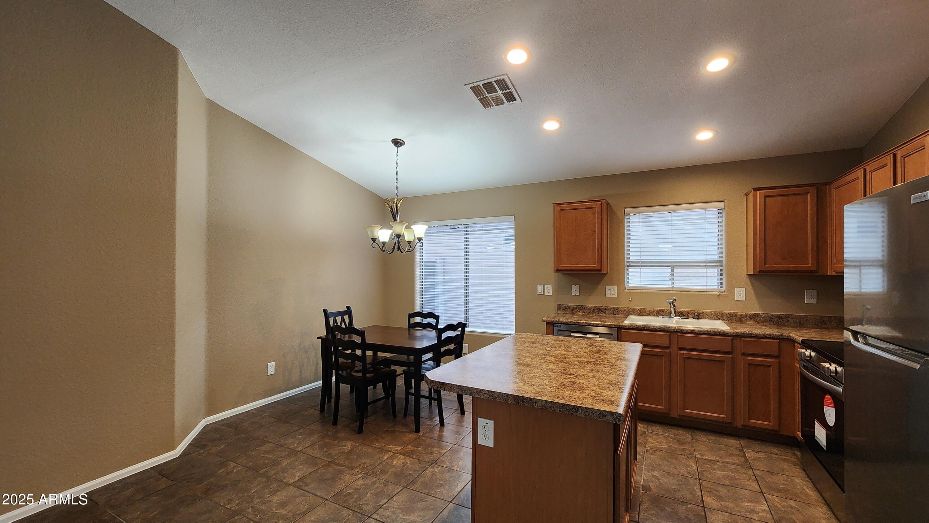 42539 West Hillman Drive Maricopa, AZ 85138 - Photo 8 of 15 42539 W HILLMAN Dr