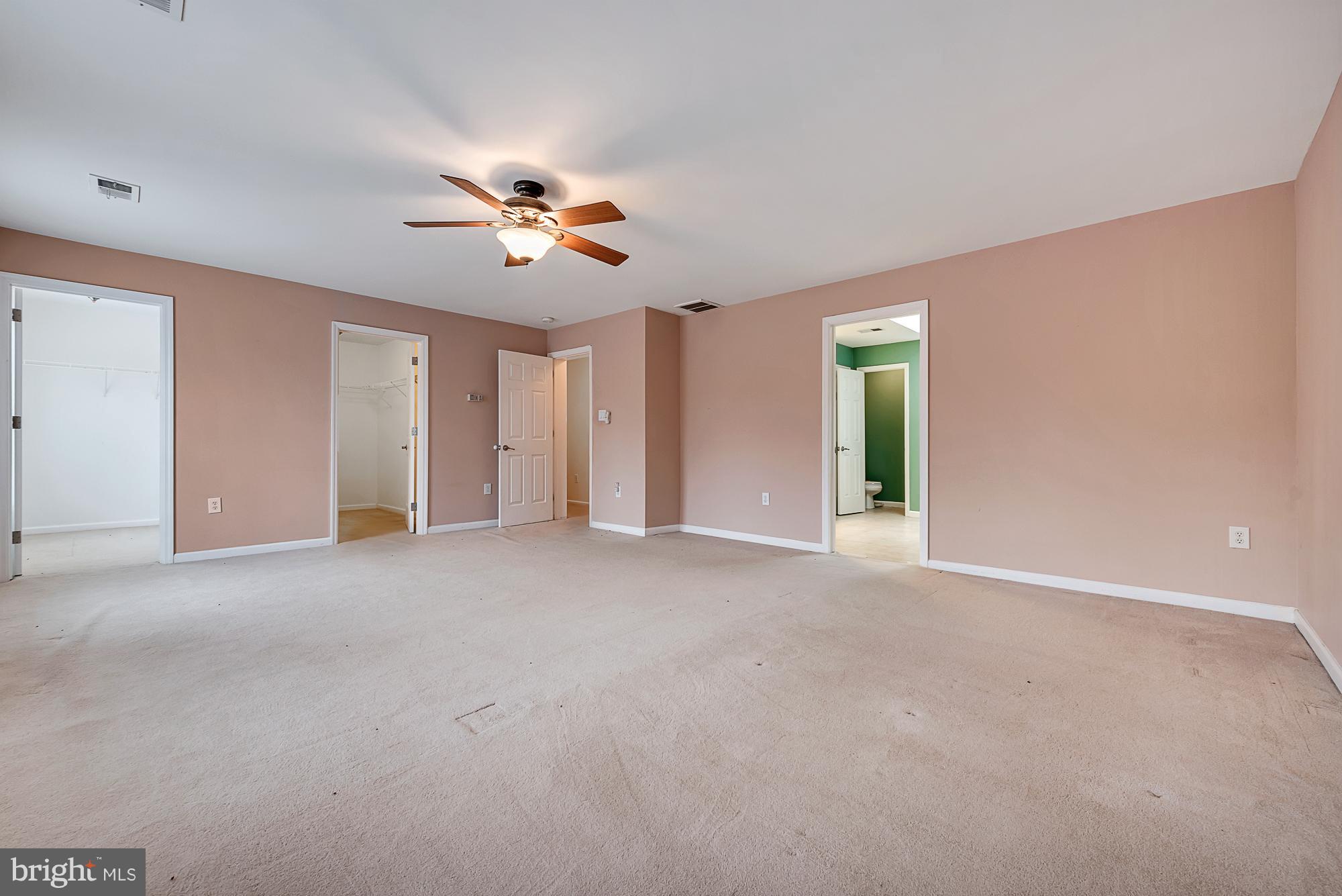 11698 Coppermine Road Union Bridge, MD 21791 - Photo 15 of 24 a view of a big room with ceiling fan and entryway