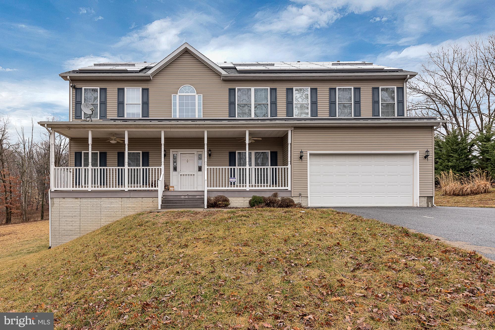 11698 Coppermine Road Union Bridge, MD 21791 - Photo 3 of 24 a house with trees in the background