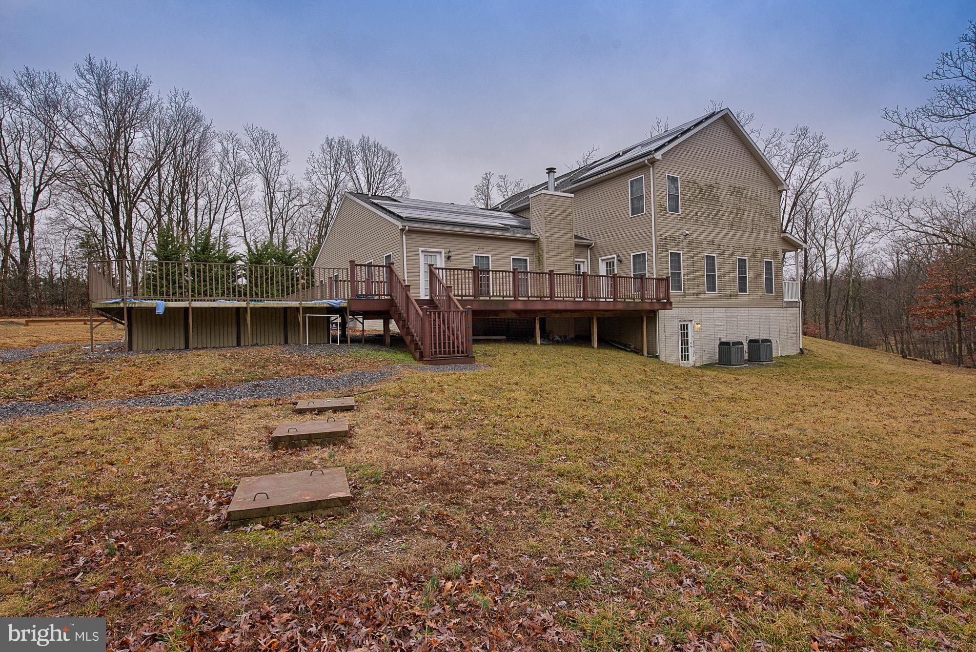 11698 Coppermine Road Union Bridge, MD 21791 - Photo 4 of 24 a view of a house with a yard