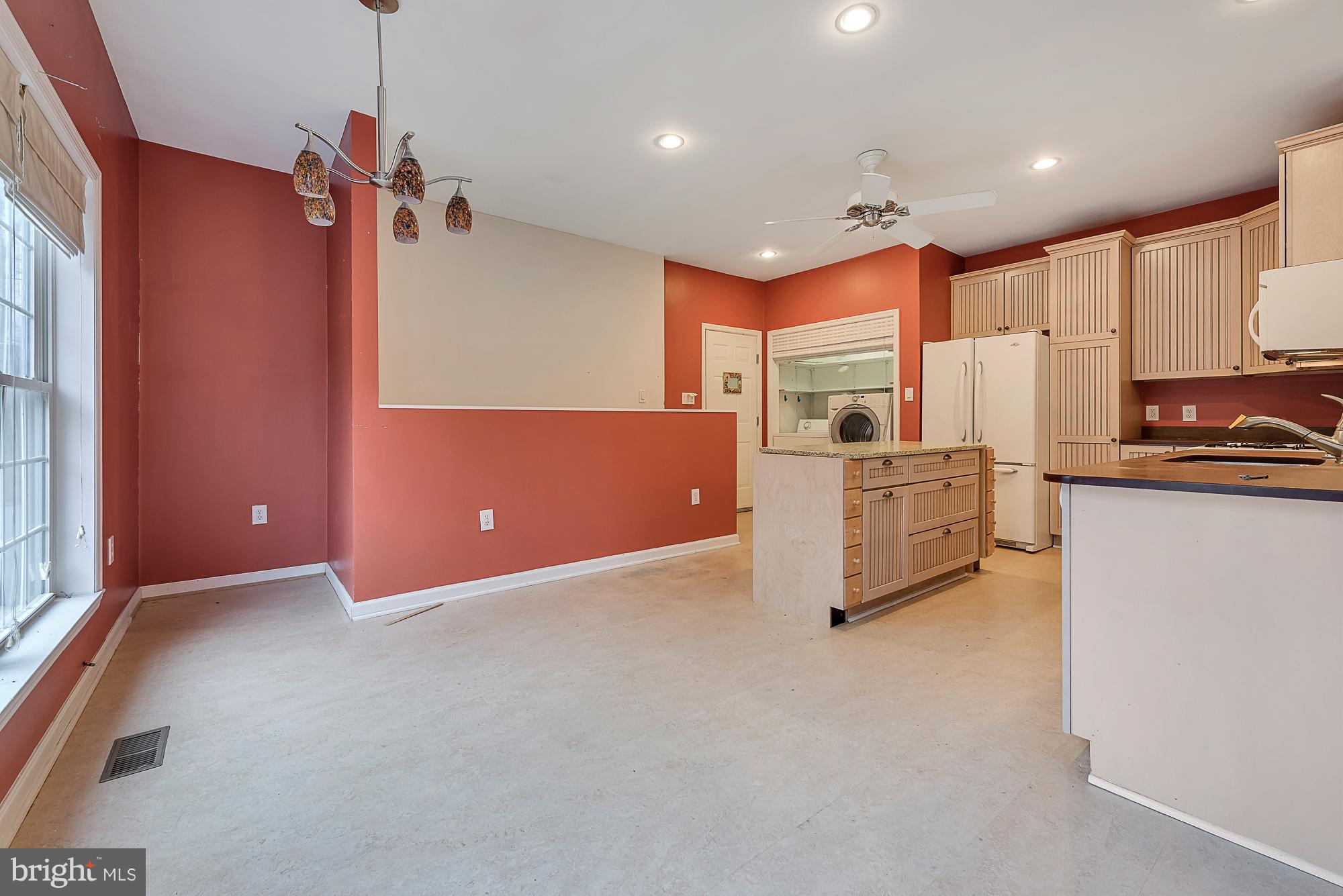 11698 Coppermine Road Union Bridge, MD 21791 - Photo 9 of 24 a kitchen with stainless steel appliances a refrigerator sink and microwave
