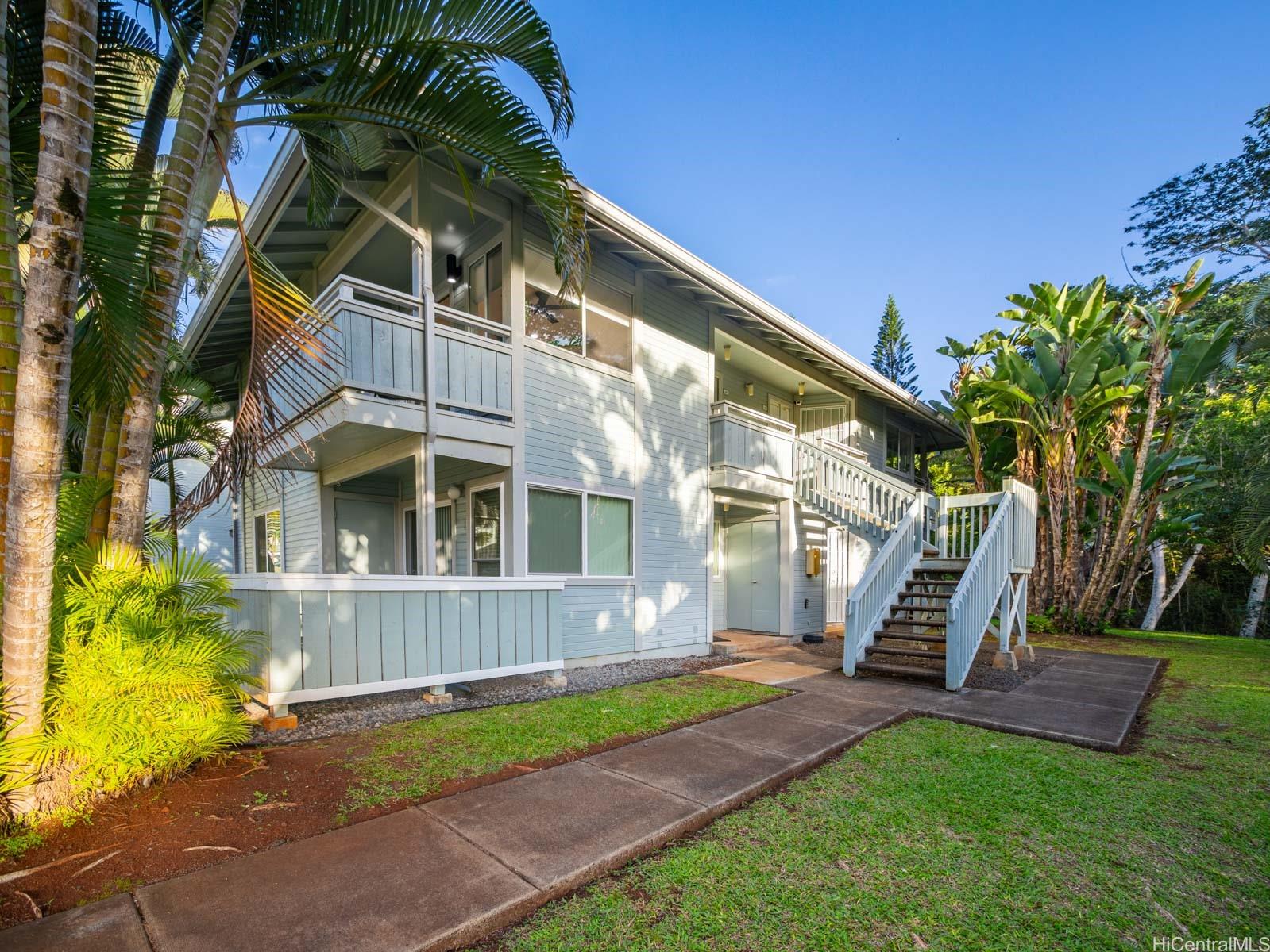 95-664 Wikao Street, Unit L205 Mililani, HI 96789 - Photo 23 of 25 a view of a house with a yard