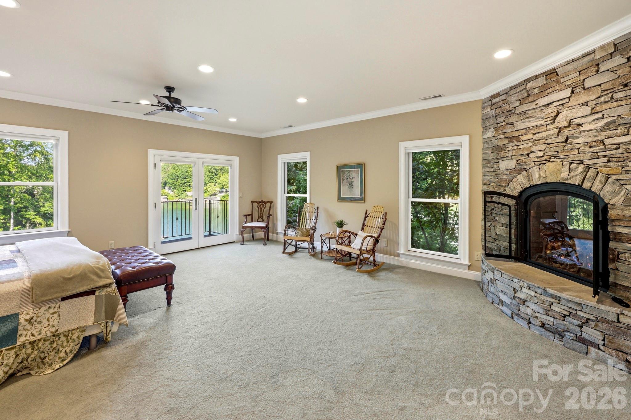 151 Garner Road Lake Lure, NC 28746 - Photo 17 of 48 a living room with furniture and a fireplace