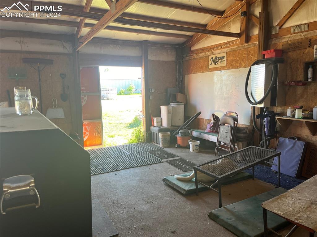 5576 County Rd G Joes, CO 80822 - Photo 17 of 30 a living room with furniture a window and a table