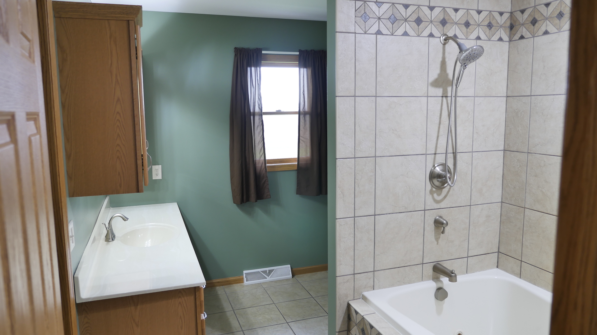 874 North 36th Road Utica, IL 61373 - Photo 7 of 14 a bathroom with a sink a window and vanity