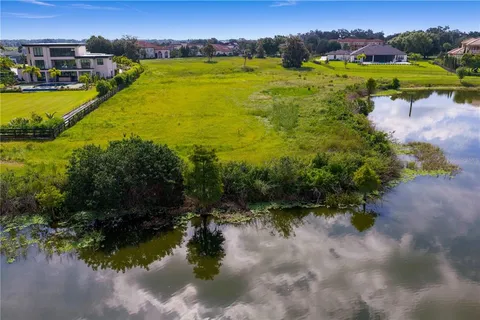 a view of a lake with a houses