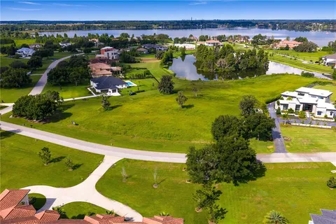 a view of a swimming pool and lake view