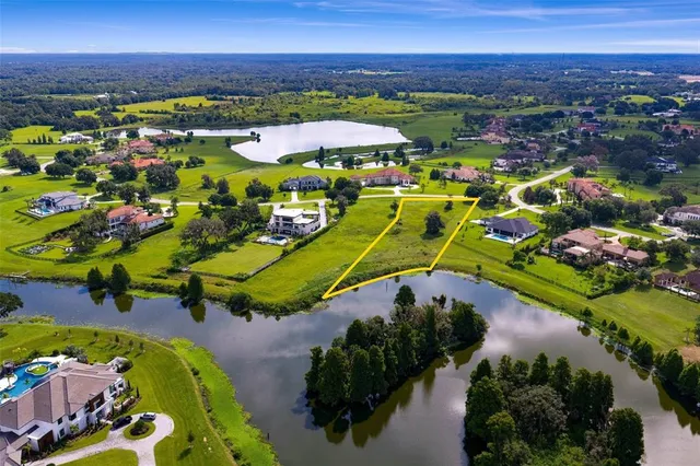 a view of a lake with a city