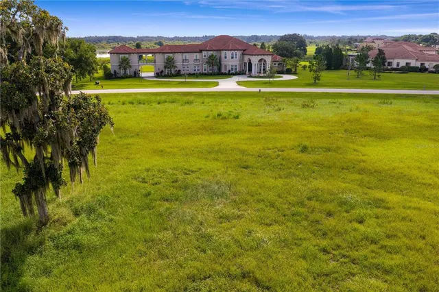 an aerial view of a house with a garden view