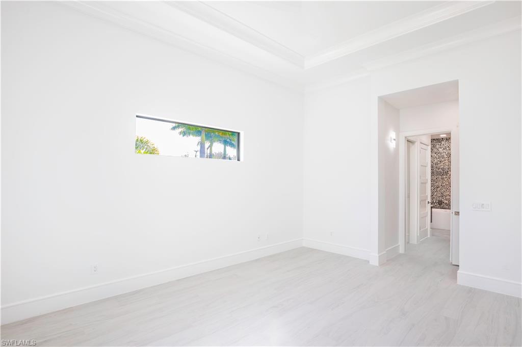 231 Legacy Court Naples, FL 34110 - Photo 23 of 35 a view of an empty room