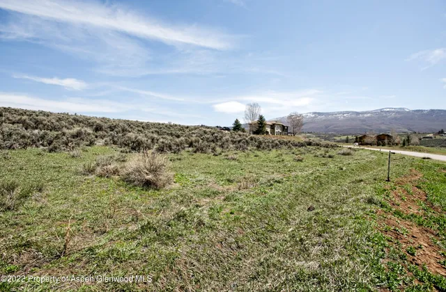 a view of a lake with a mountain in the background