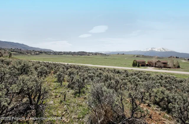 a view of a lake with a mountain