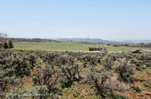 a view of lake and mountain