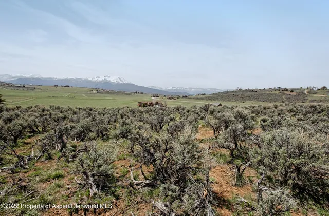 a view of lake with mountain