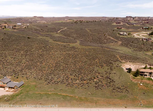 a view of a lake in middle of the town