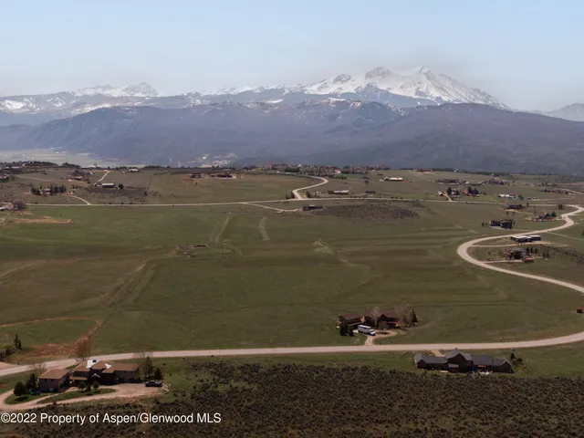 a view of a lake from a yard